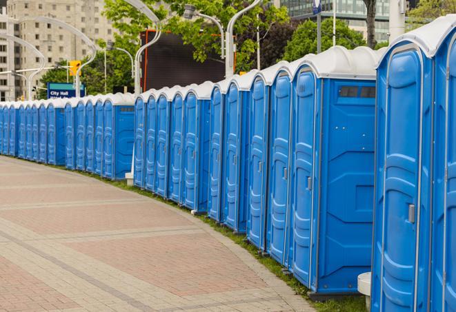 a line of portable restrooms at a sporting event, providing athletes and spectators with clean and accessible facilities in Antioch CA